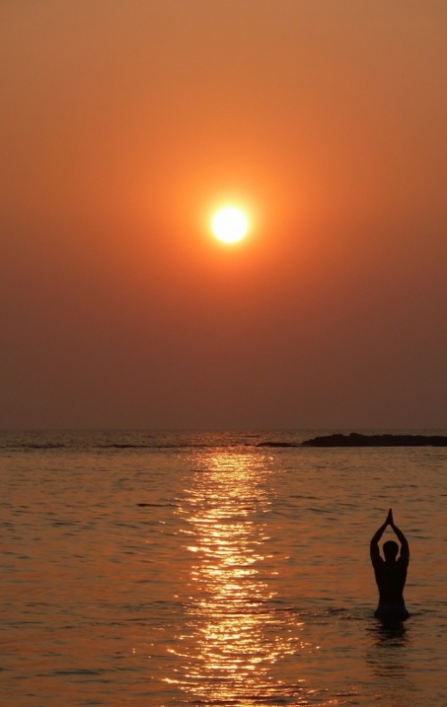 Praying to the sunset // Gokarna