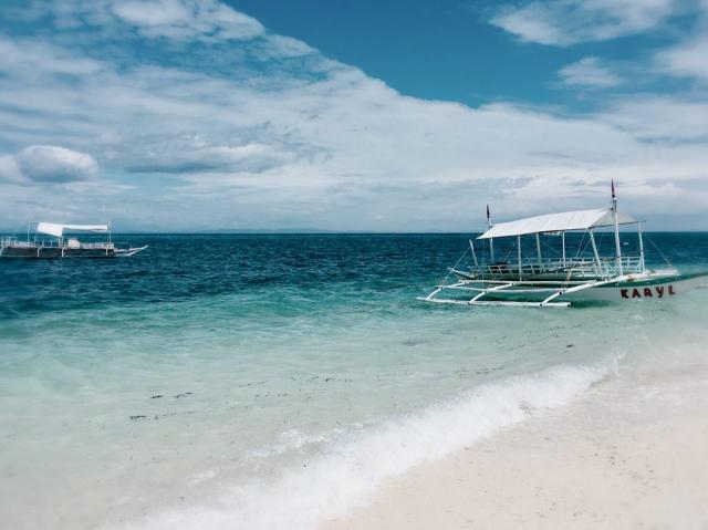 . "boat on the...sea"